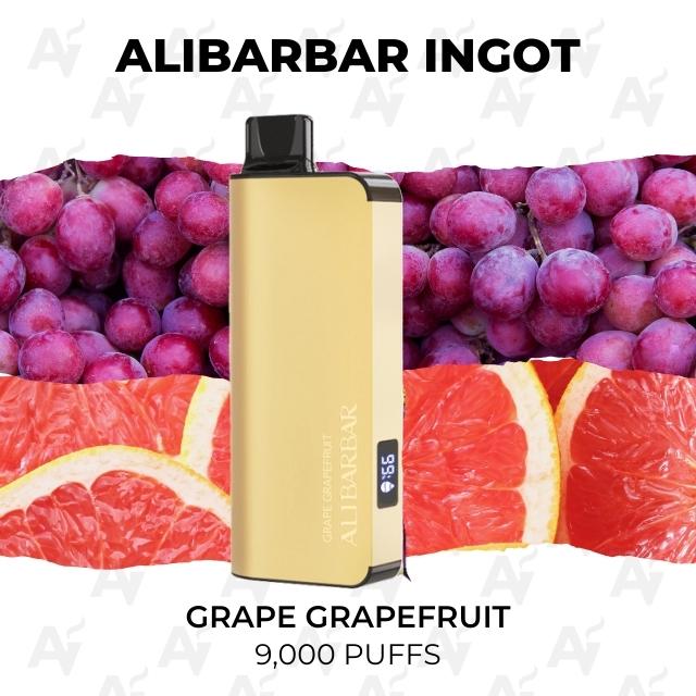 Alibarbar Ingot 9000 Puffs Grape Grapefruit - Just Vapes Australia - Alibarbar-ingot-9000-puffs-grape-grapefruit - Just Vapes Australia Alibarbar Ingot 9000 Puffs Grape Grapefruit - Just Vapes Australia - Gold Vape Device with Black Mouthpiece Standing Upright Against Grapefruit Slices and Purple Grapes; Text Reads 'alibarbar Ingot' and 'grape Grapefruit 9,000 Puffs'