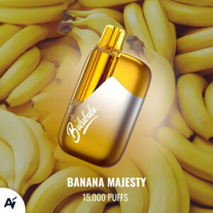 Gold and silver banana-scented vape device resting on a pile of ripe bananas, labeled Banana Majesty, 15,000 puffs.